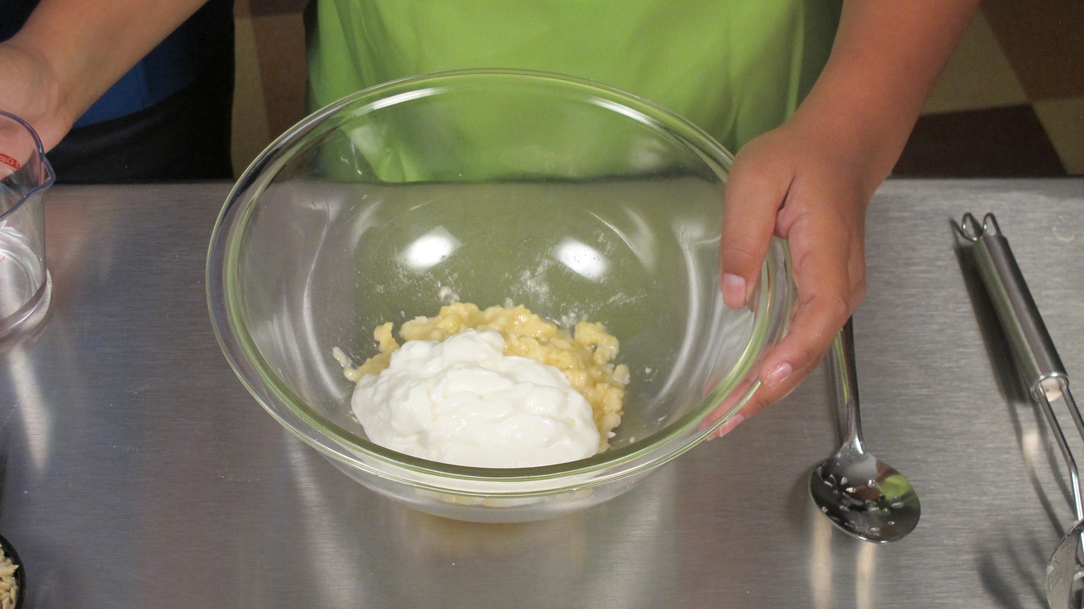 Mash bananas and add yogurt.
