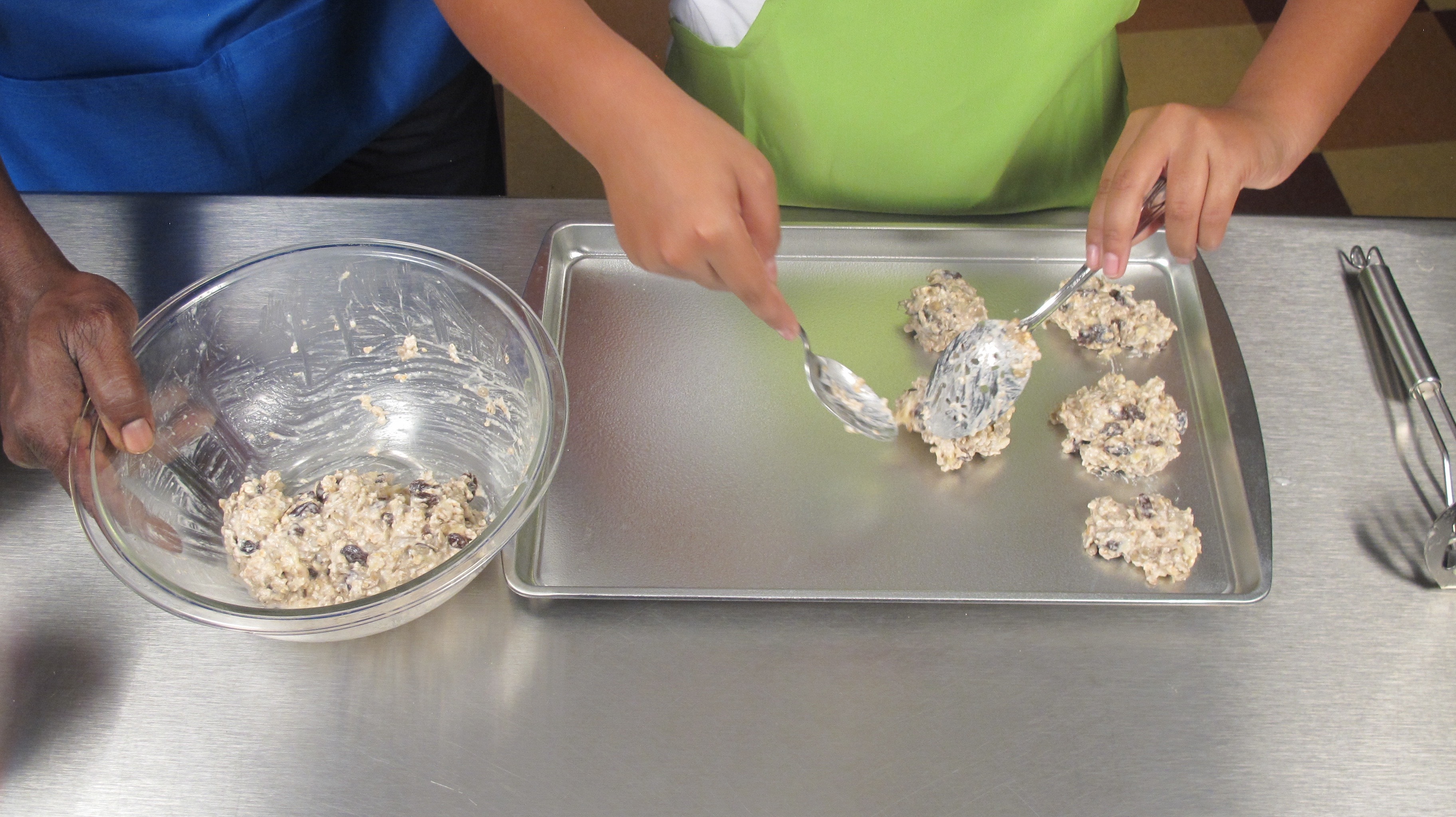 Grease baking sheet. Place a tablespoon of dough on the sheet and thin out to make into a flat disk. Repeat with the remaining dough. Refrigerate any leftovers.