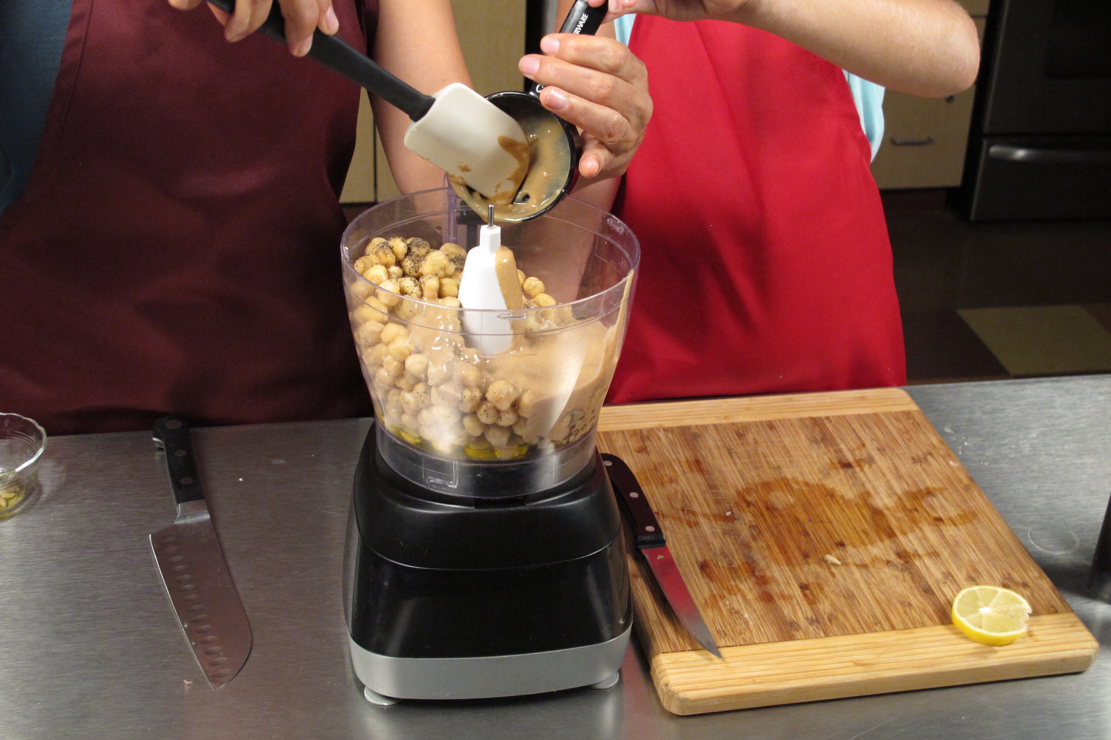 Add olive oil, salt, pepper, and optional tahini.